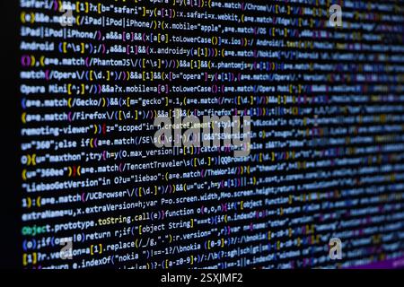 TitleSoftware source code. Programming code. Programming code on computer screen. Developer working on program codes in office. Source code Stock Photo