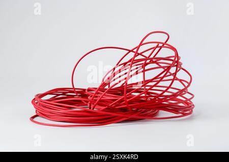 Insulated red electrical wire isolated on white Stock Photo