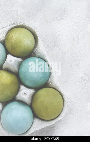 Easter colored eggs, in green and turquoise tones, Easter card, top view, no people Stock Photo