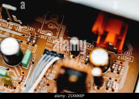 Internal view of complex electronic circuit board. Top down, close up ...