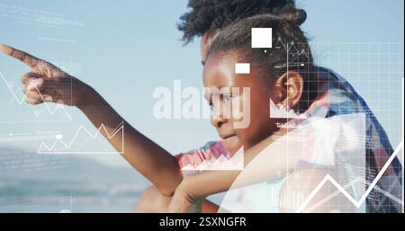 Image of financial data processing over afrcian american woman with sun by sea Stock Photo