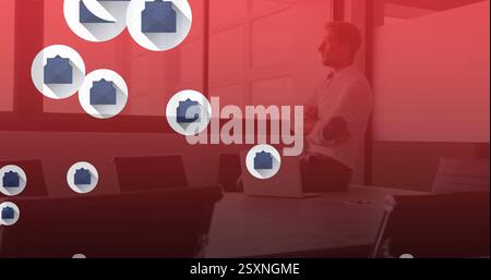 Businessman in office with file icons, data management image over workspace Stock Photo