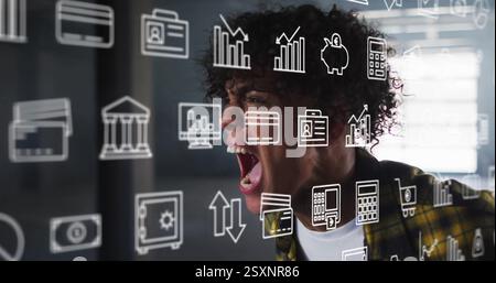 Image of business icons over biracial man screaming Stock Photo