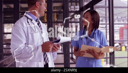 Image of scientific data processing over diverse doctors Stock Photo