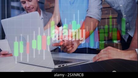 Financial data chart image over diverse business team analyzing documents Stock Photo