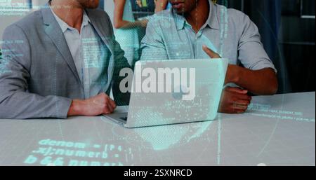 Binary code image over business people discussing work at laptop Stock Photo