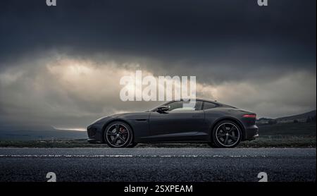 Jaguar F-Type R in dramatic landscape Stock Photo