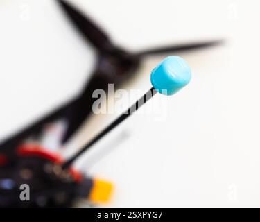 FPV drone in production on white background. Stock Photo