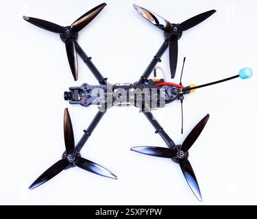FPV drone in production on white background. Stock Photo