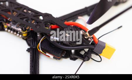 FPV drone in production on white background. Stock Photo
