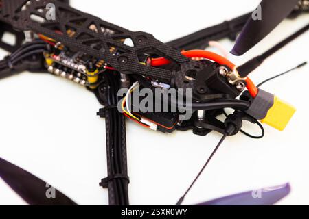 FPV drone in production on white background. Stock Photo