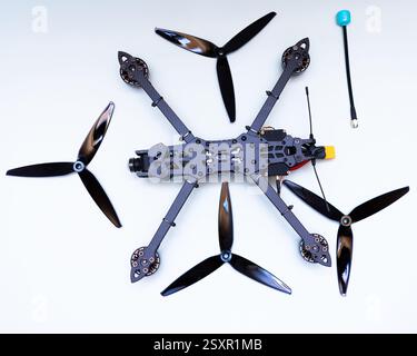 FPV drone in production on white background. Stock Photo