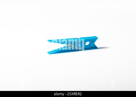 Plastic clothes peg isolated on white background Stock Photo