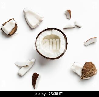 Pieces of coconut on white Stock Photo