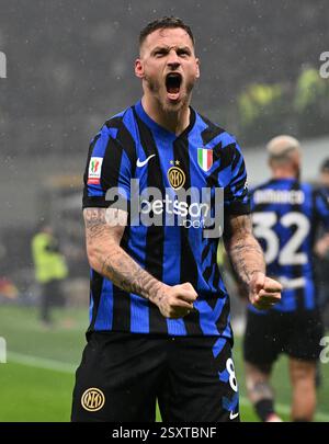 Inter Milan's Marko Arnautovic in action between Feyenoord's Jeyland ...