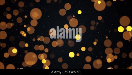 Image of yellow spots over black background Stock Photo