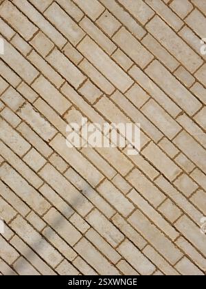 Diagonal Beige Lime Stone Brick Pavement in Saudi Arabia Stock Photo