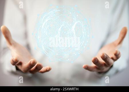 Close up to businessman standing and holding digital globe Stock Photo