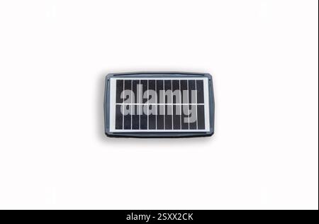 Portable solar panel isolated on white background. Small solar battery cell panel. Renewable and clean energy concept Stock Photo