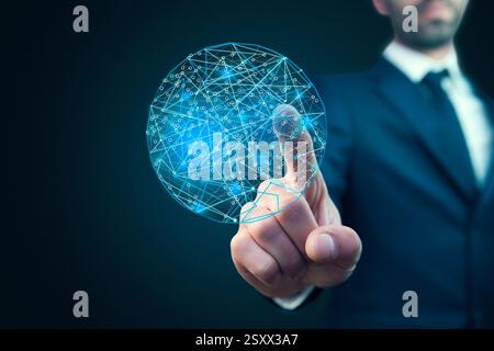 Man hand holding digital Earth planet representing global technologies concept Stock Photo