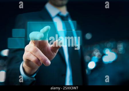businessman hand pushing button on a touch screen interface Stock Photo
