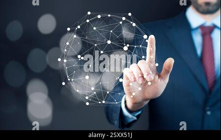 Man hand holding digital Earth planet representing global technologies concept Stock Photo
