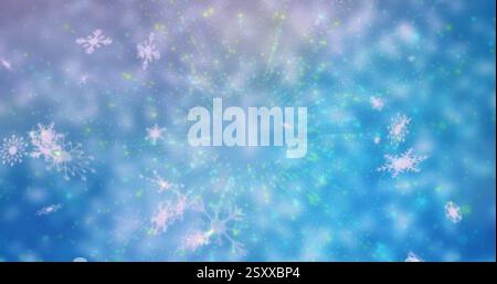 Image of snowflakes falling on blue background Stock Photo