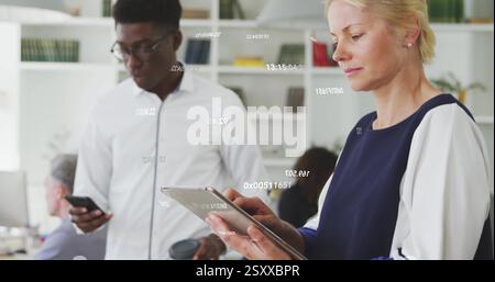Image of numeric data processing over caucasian businesswoman using tablet at casual office Stock Photo