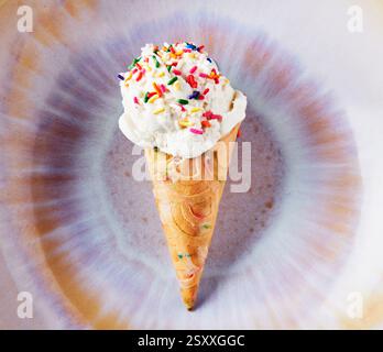 Vanilla ice cream cone with sprinkles Stock Photo