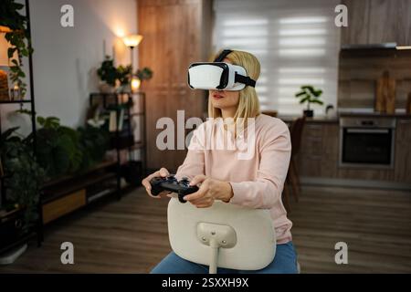 Immersive gaming adventure in a modern living room with virtual reality technology Stock Photo