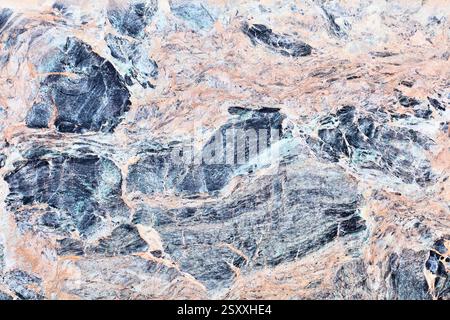 Marble texture background. Blue orange breccia marble or serpentinite stone surface backdrop. Stock Photo