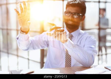 Nervous millennial male freelancer see critical mistake incorrect information in paper document Stock Photo
