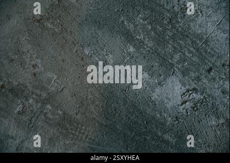 Background of dirty concrete floor with footsteps and lines on it. Stock Photo