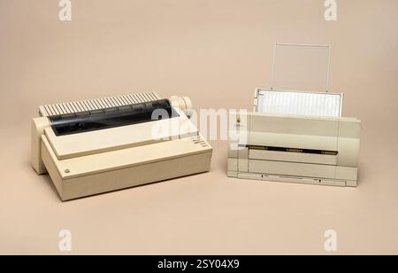 Pavia, Lombardy, Italy - November 2, 2024: Apple printers ImageWriter II (dot matrix), from 1985, and StyleWriter (inkjet), from 1991 at Ctrl+Alt Muse Stock Photo