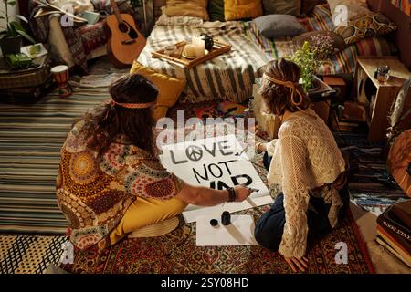 Creating Peace Poster in Cozy Bohemian Room Stock Photo