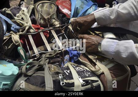 Lunchboxes tied on cycle at mumbai maharashtra India Stock Photo