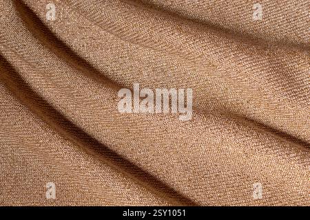 Texture of golden brown fabric. Abstract background Stock Photo