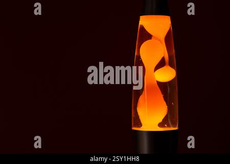 Illuminating lava lamp in a dark Stock Photo