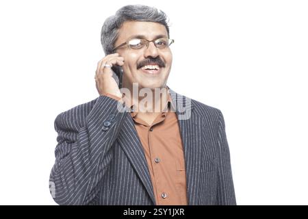 Man talking on mobile, india, asia, mr#790g Stock Photo