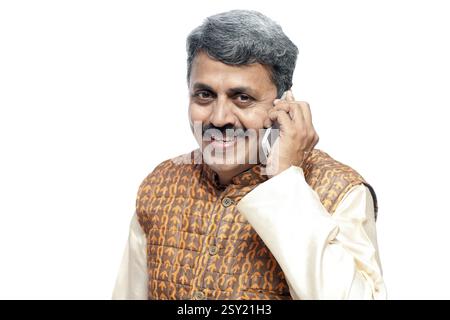 Man politician talking on mobile phone, india, asia, mr#790g Stock Photo