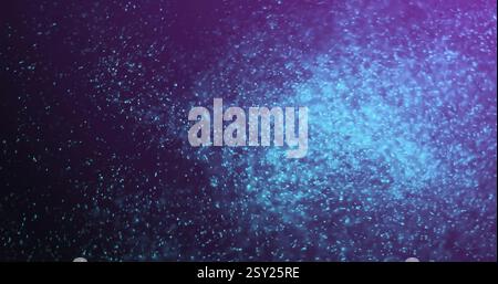 Blue particles floating and glowing, creating magical image effect Stock Photo