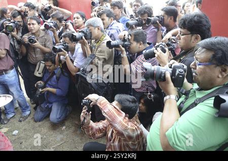 Photographers taking photos of women on occasion of Sindur Khela at Kolkata India Stock Photo