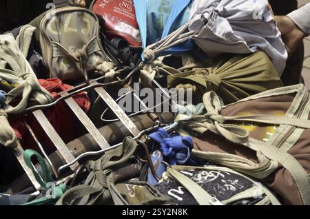 Lunchboxes tied on cycle at mumbai maharashtra India Stock Photo
