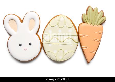 Tasty Easter cookies in shape of egg, bunny and carrot isolated on white background Stock Photo