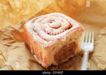 Cinnamon roll, a breakfast pastry from a bakery      Copy space Stock Photo