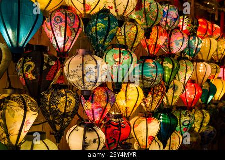 Colourful, illuminated lanterns are on sale in a shop in the old town of Hoi An, Hội An. Stock Photo
