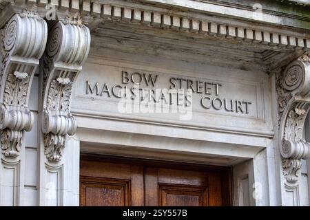 Sign above the entrance to the historic Bow Street Magistrates Court building in London, UK.  The building is now a hotel. Stock Photo