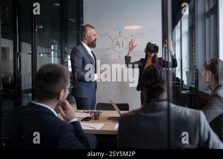 Business professionals in a modern office discussing artificial intelligence strategy. A woman wearing a VR headset gestures while presenting. Concept Stock Photo