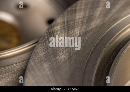 new metal car brake disc, steel car part to ensure braking Stock Photo