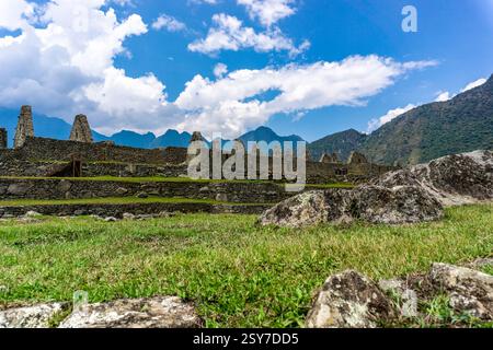 Breathtaking view of Machu Picchu and its ancient Inca ruins nestled among the high peaks of the Andes Mountains in Peru Stock Photo